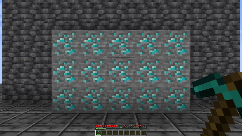 Eine Diamantader aus fünfzehn Blöcken vor dem Abbau, die Diamantspitzhacke in der Hand
