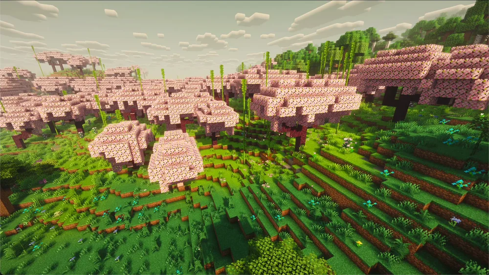 A cherry grove under shaders in All the Mods 9